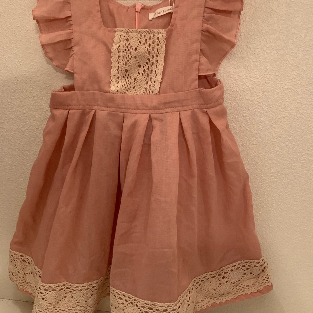 Blush dress with lace detailing. Beautiful dress!!